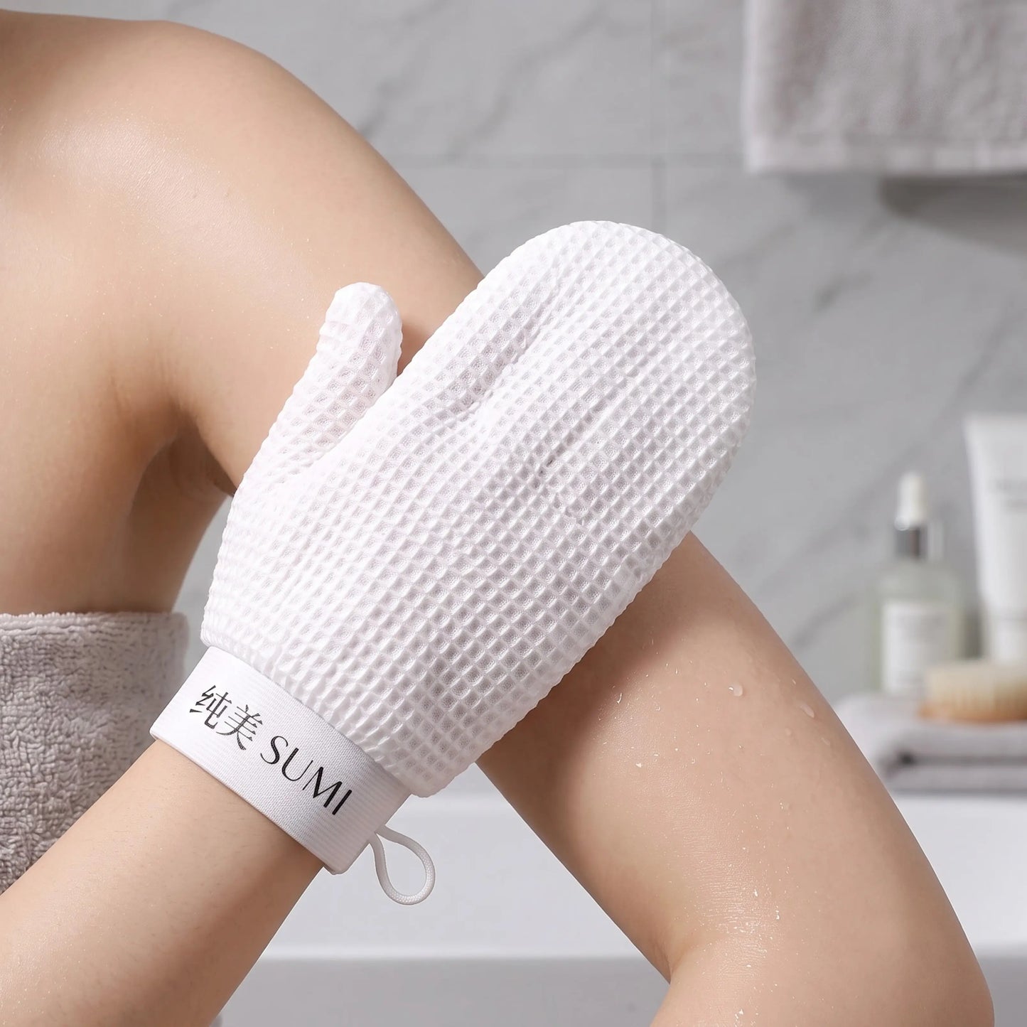 SUMI Glove - Złuszczająca rękawica do ciała